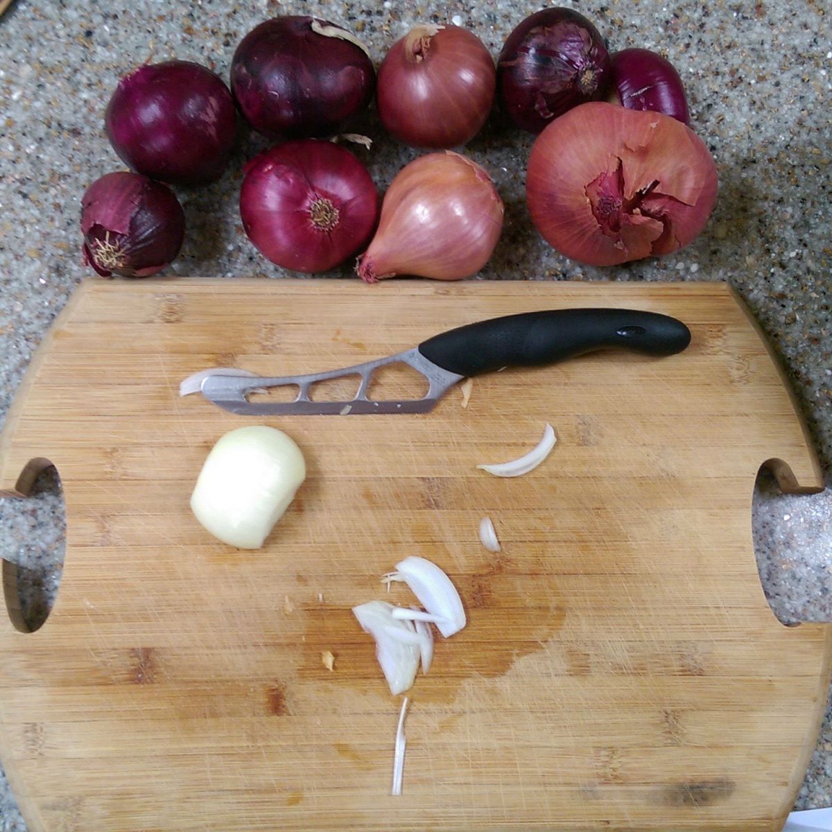 Onion skin removed, thin half moon slices.
